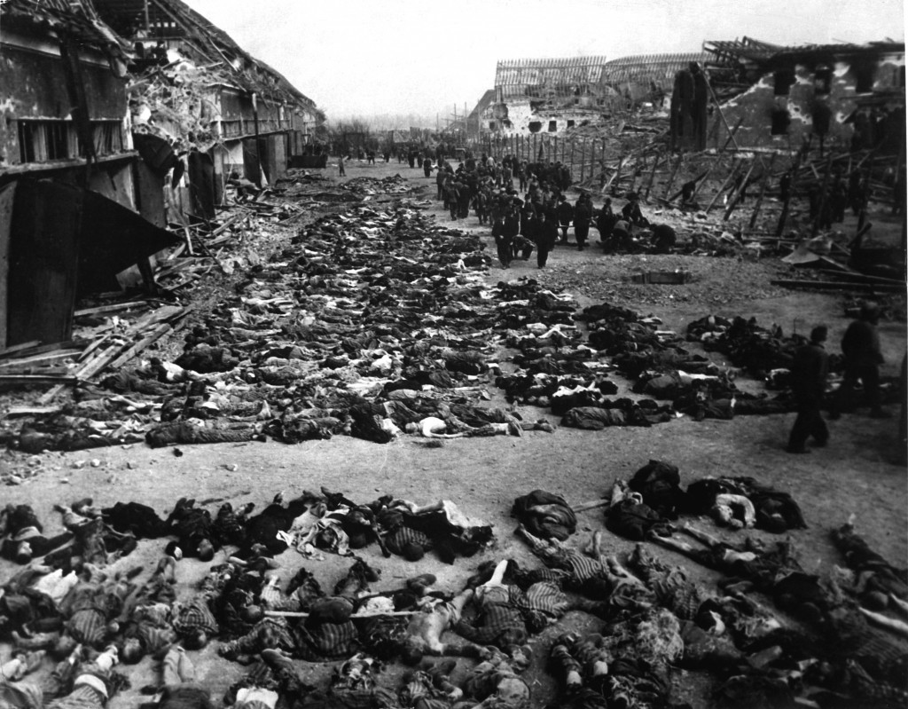 Rows of bodies of dead inmates fill the yard of Lager Nordhausen, a Gestapo concentration camp.  This photo shows less than half of the bodies of the several hundred inmates who died of starvation or were shot by Gestapo men.  Germany, April 12, 1945.  Myers.  (Army) NARA FILE #:  111-SC-203456 WAR & CONFLICT BOOK #:  1121